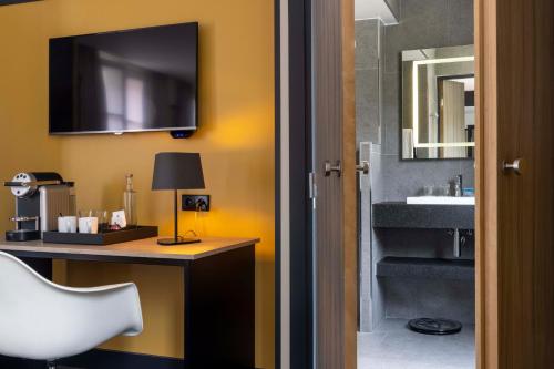 Habitación Executive del hotel Opéra Liège. Foto 12