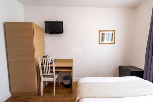 Habitación Doble con bañera del hotel Hôtel De L'union. Foto 3