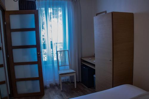 Habitación Individual Estándar con baño y aseo compartidos del hotel Hôtel De L'union