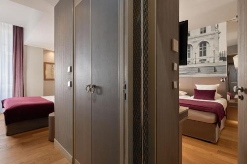 Dos habitaciones contiguas con acceso al spa del hotel La Lanterne and Spa By Timhotel. Foto 2