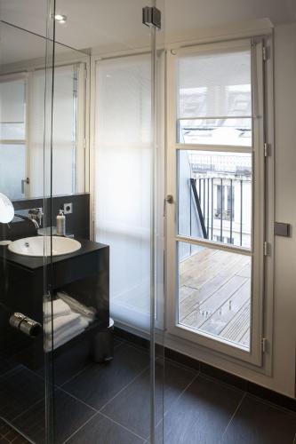 Habitación Privilege con terraza y acceso al spa - Planta superior del hotel La Lanterne and Spa By Timhotel. Foto 2