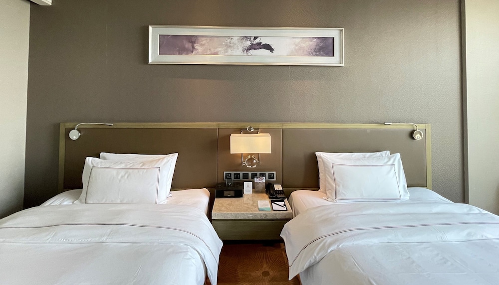 Habitación Doble con Dos Camas Meliá con Vistas a la Ciudad del hotel Melia Jinan. Foto 1