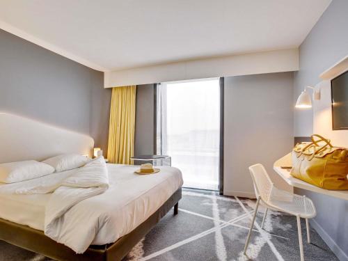 Habitación Doble Estándar del hotel ibis Styles Paris CDG Airport. Foto 8