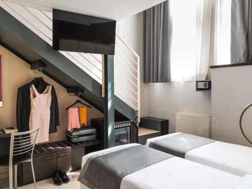 Habitación del hotel Ibis Styles Milano Centro. Foto 1