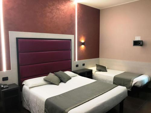 Habitación Triple del hotel Ibis Styles Milano Centro. Foto 3