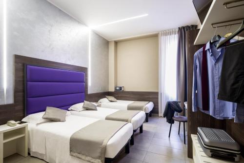 Habitación Triple del hotel Ibis Styles Milano Centro. Foto 7