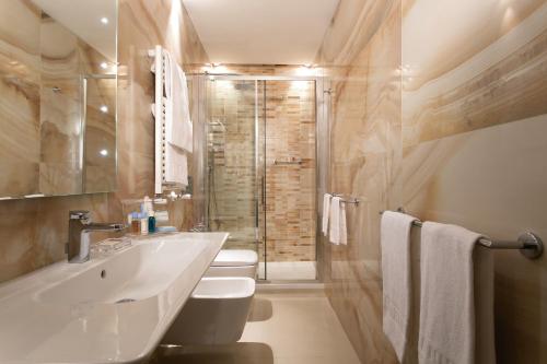 Habitación Doble Deluxe - 1 o 2 camas del hotel Stendhal Luxury Suites. Foto 1