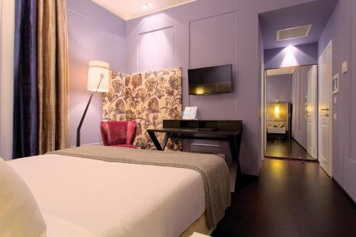 Habitación Doble Deluxe - 1 o 2 camas del hotel Stendhal Luxury Suites. Foto 5