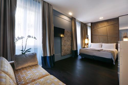 Habitación Triple Executive del hotel Stendhal Luxury Suites. Foto 4