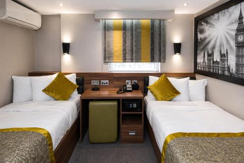Compact Twin Room, with en suite del hotel London Court. Foto 8