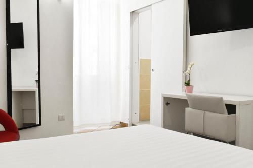 Habitación Doble Económica del hotel Roma Resort Colosseum. Foto 8