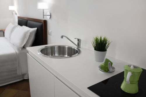 Habitación Familiar del hotel Roma Resort Colosseum. Foto 11