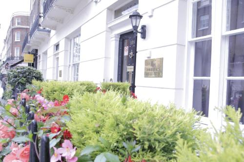 Habitación cuádruple del hotel Astors Belgravia. Foto 1