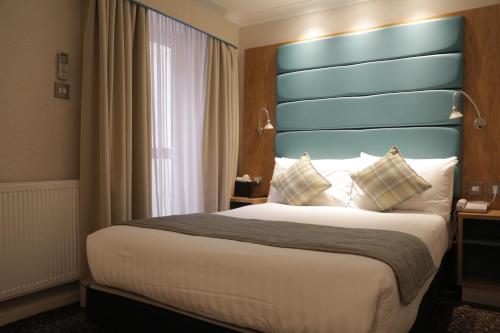 Habitación Familiar del hotel Astors Belgravia. Foto 4