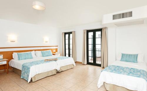 Habitación Doble del hotel Globales Pueblo Andaluz. Foto 5