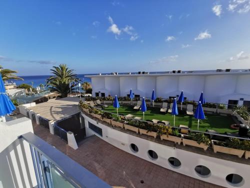 Apartamento con vistas a la piscina del hotel Igramar Morrojable - Adults Only. Foto 12