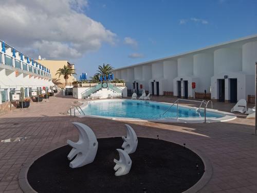 Apartamento con vistas a la piscina del hotel Igramar Morrojable - Adults Only. Foto 13