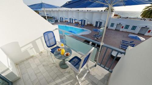 Apartamento con vistas a la piscina del hotel Igramar Morrojable - Adults Only. Foto 20