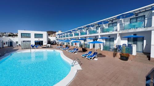 Apartamento con vistas a la piscina del hotel Igramar Morrojable - Adults Only. Foto 26