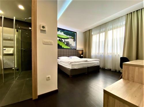 Habitación Doble Deluxe del hotel Meksiko. Foto 1