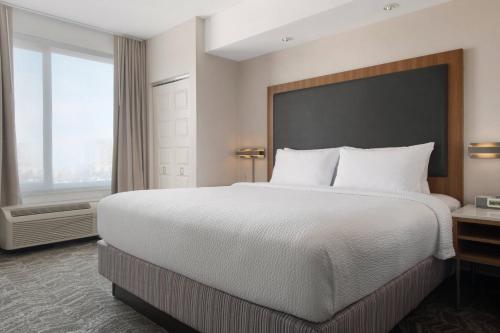Queen Room with Two Queen Beds and Patio - Hearing Accessible del hotel Springhill Suites By Marriott Syracuse Carrier Circle