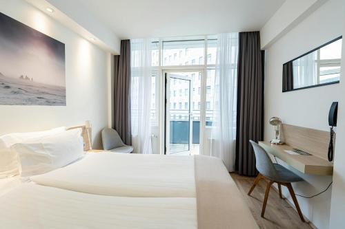 Habitación Estándar con balcón del hotel Storm Hotel By Keahotels. Foto 1