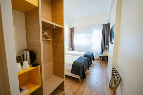 Habitación Doble Económica - 2 camas del hotel Storm Hotel By Keahotels. Foto 2