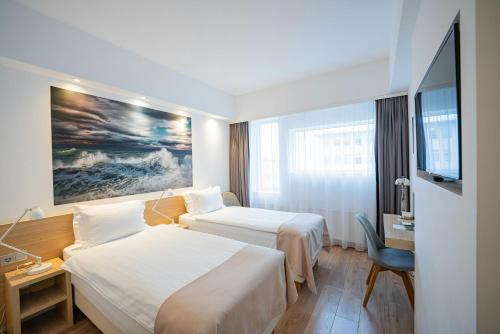 Habitación Doble Estándar - 2 camas del hotel Storm Hotel By Keahotels. Foto 4