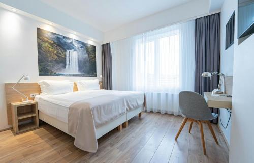 Habitación Estándar con balcón del hotel Storm Hotel By Keahotels. Foto 7