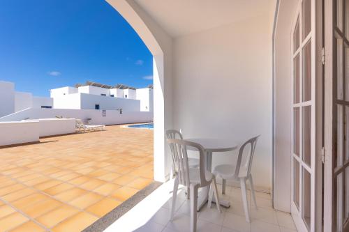 Apartamento - 1 Dormitorio con balcón o terraza del hotel Corona Mar. Foto 2