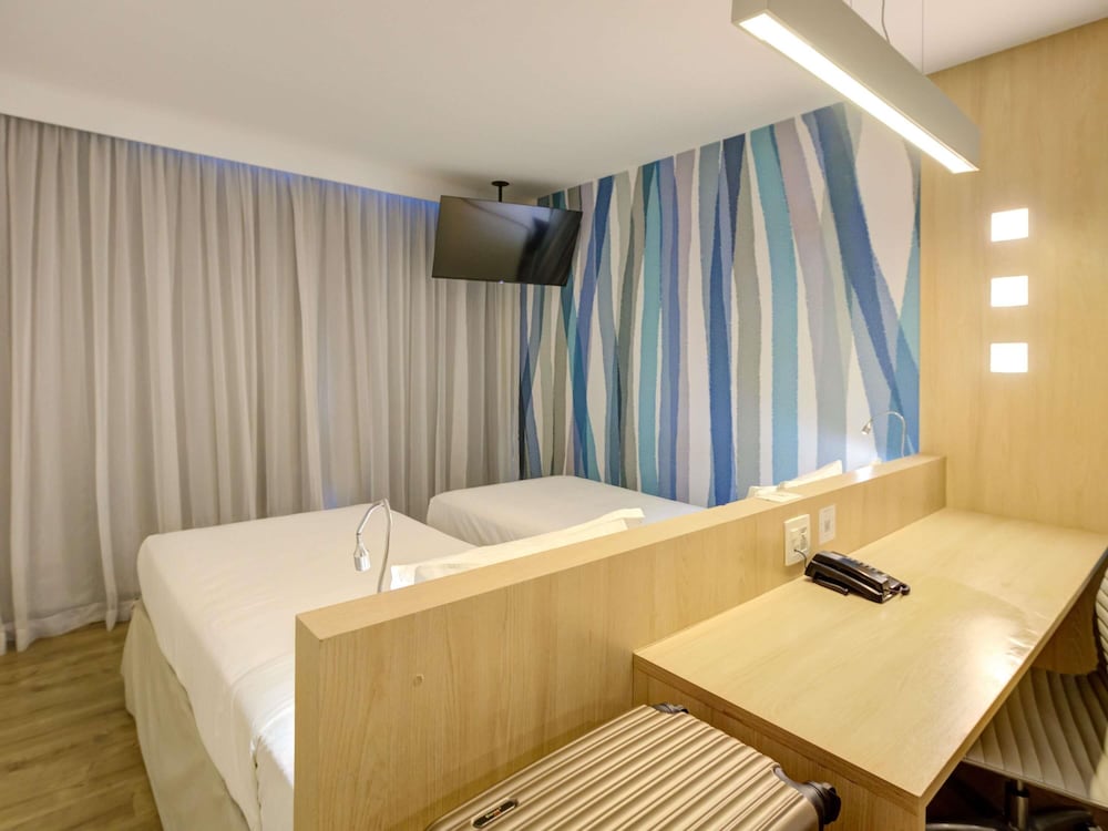 Habitación estándar con 2 camas individuales del hotel Mercure Rio De Janeiro Barra Da Tijuca. Foto 1