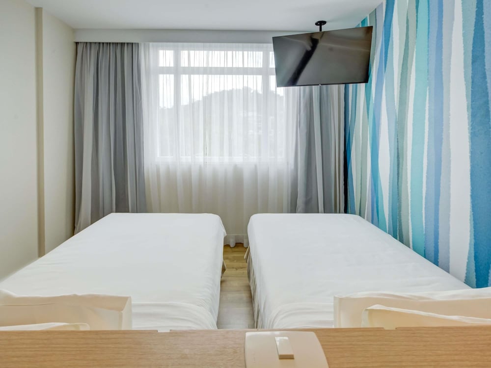 Habitación estándar con 2 camas individuales del hotel Mercure Rio De Janeiro Barra Da Tijuca. Foto 2