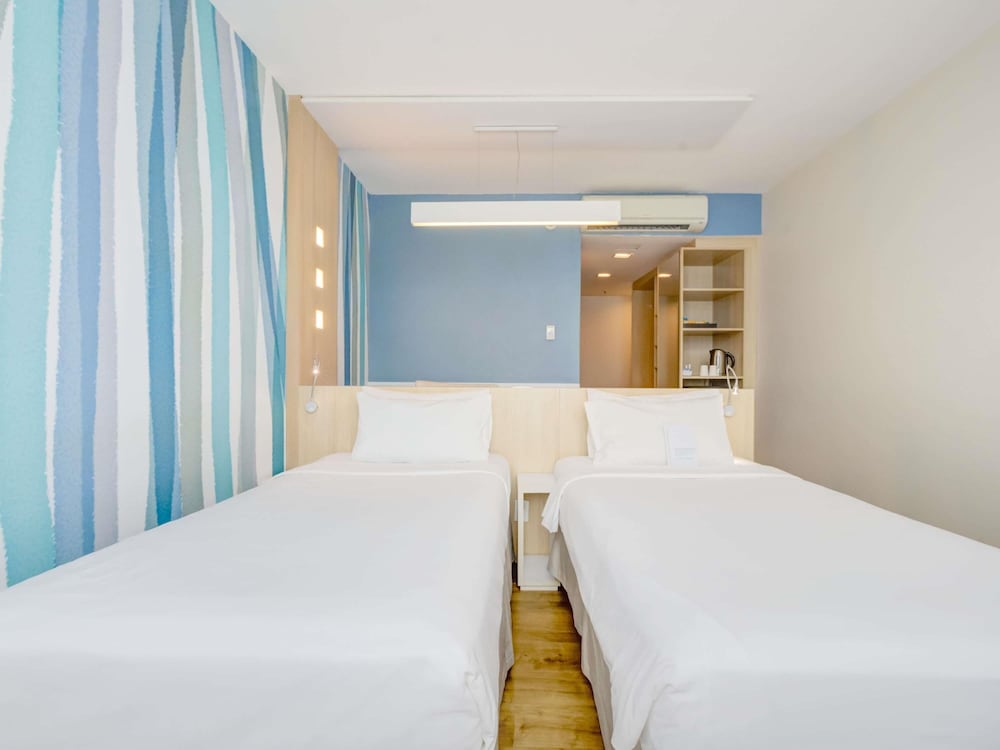 Habitación estándar con 2 camas individuales del hotel Mercure Rio De Janeiro Barra Da Tijuca. Foto 6