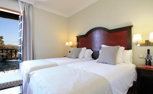 Superior Triple Room del hotel Finca De La Florida. Foto 7