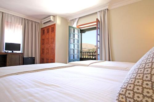 Habitación Triple Superior del hotel Finca De La Florida. Foto 5