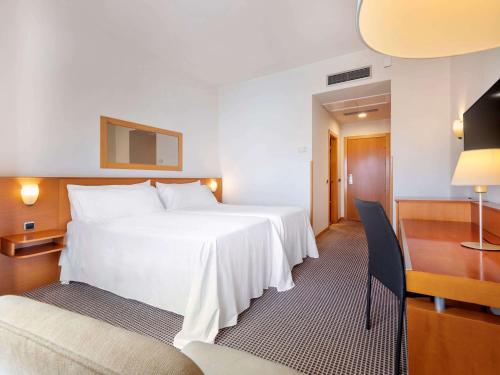 Habitación Estandar del hotel Zentral León. Foto 2
