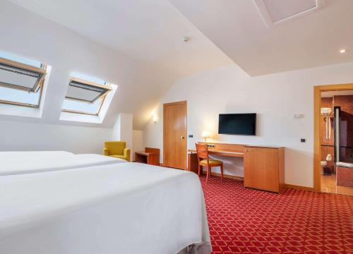 Habitación Triple Estándar del hotel Zentral León. Foto 3
