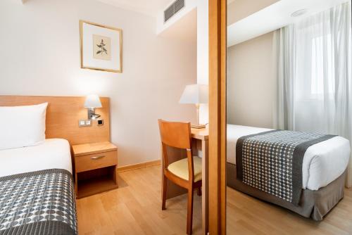 Habitación Individual del hotel Exe Puerta de San Pedro. Foto 1