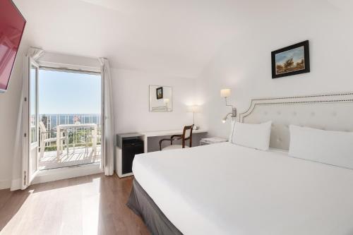 Habitación Doble con Terraza del hotel Exe Victoria Palace. Foto 6