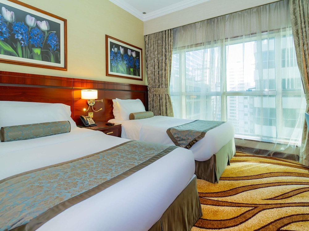 Suite de dos dormitorios del hotel Majlis Grand Mercure Residence Abu Dhabi. Foto 7