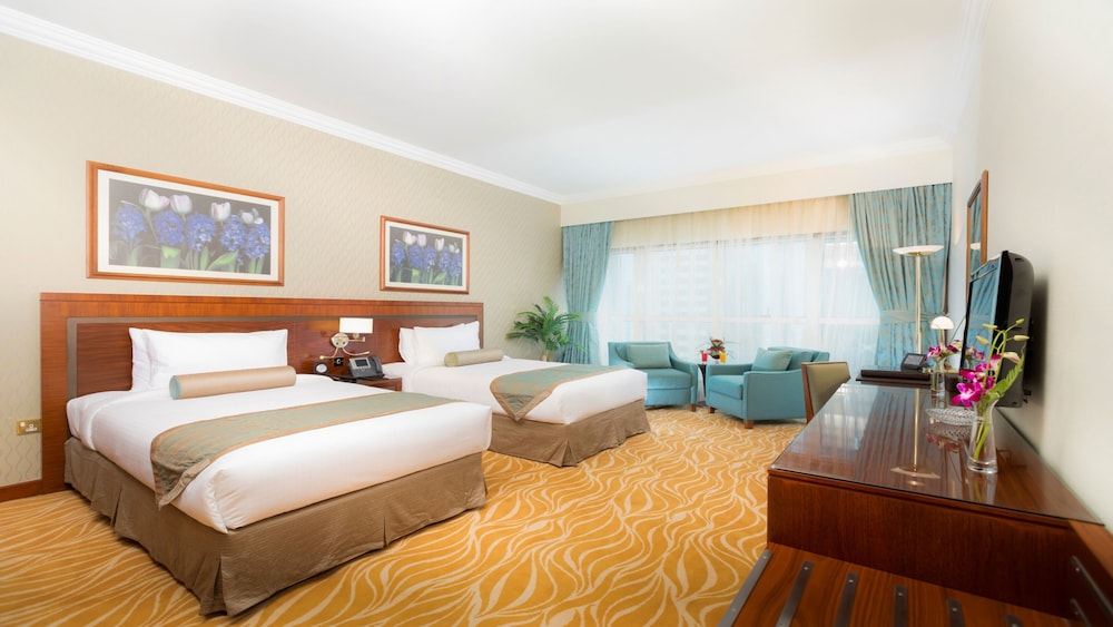 Estudio con camas gemelas del hotel Majlis Grand Mercure Residence Abu Dhabi. Foto 1