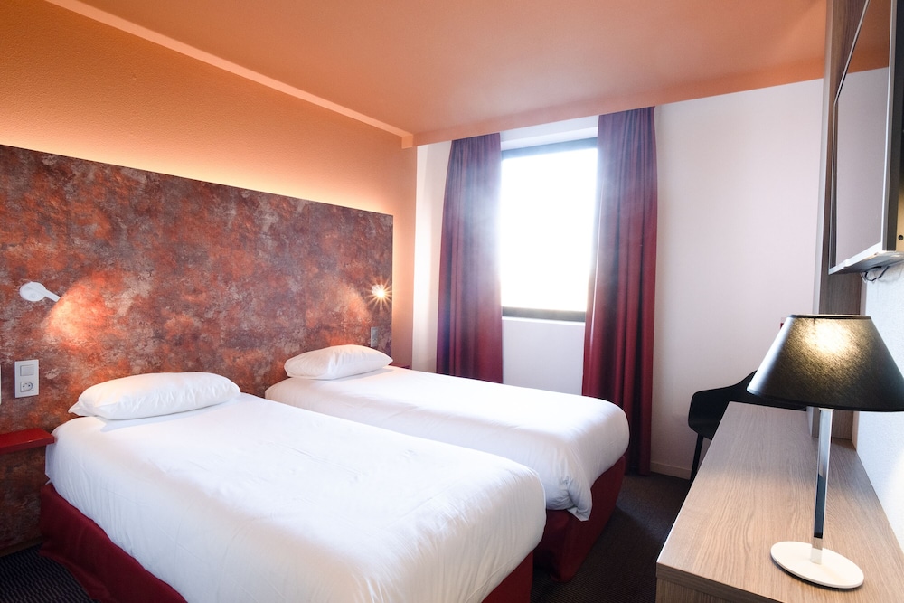 Habitación Standard con dos camas individuales del hotel Ibis Styles Toulouse Cite Espace. Foto 1