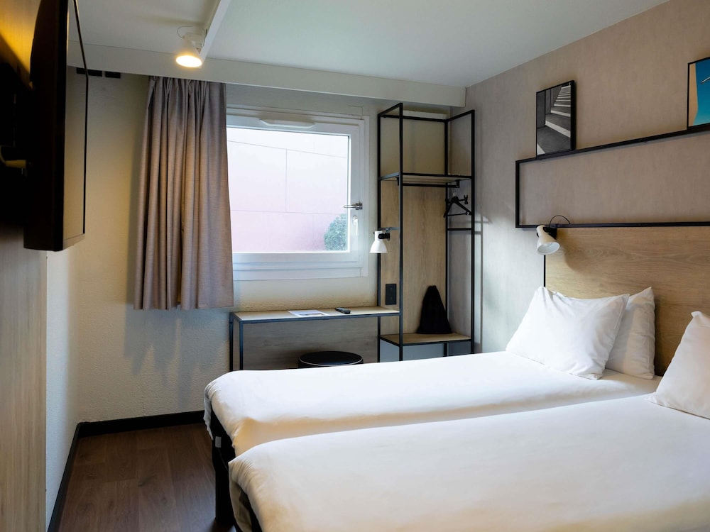 Habitación superior, 2 camas individuales del hotel Ibis Toulouse Airport. Foto 3