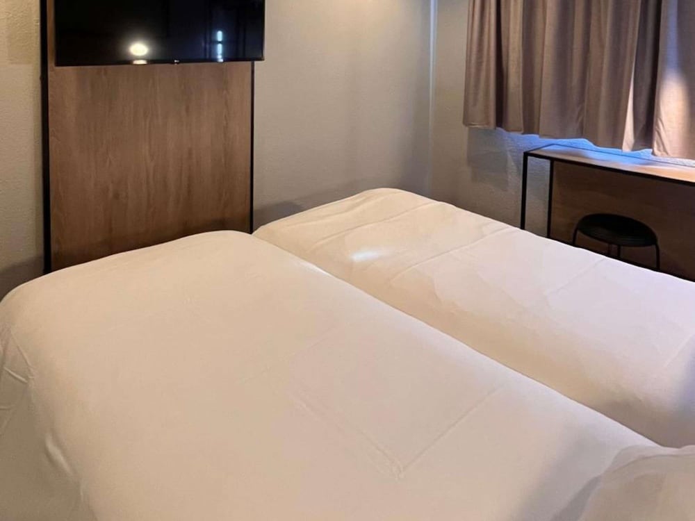 Habitación superior, 2 camas individuales del hotel Ibis Toulouse Airport. Foto 8