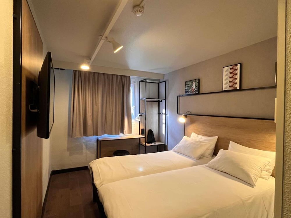 Habitación superior, 2 camas individuales del hotel Ibis Toulouse Airport. Foto 9