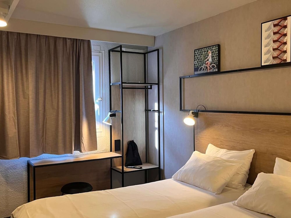 Habitación superior, 2 camas individuales del hotel Ibis Toulouse Airport. Foto 10