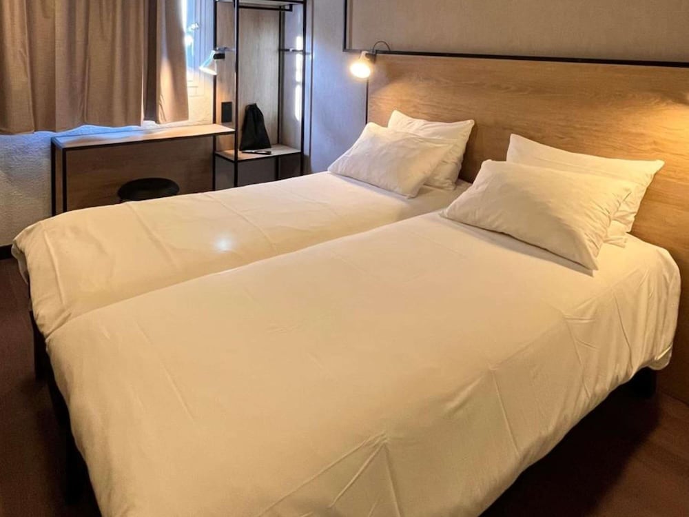 Habitación superior, 2 camas individuales del hotel Ibis Toulouse Airport. Foto 12