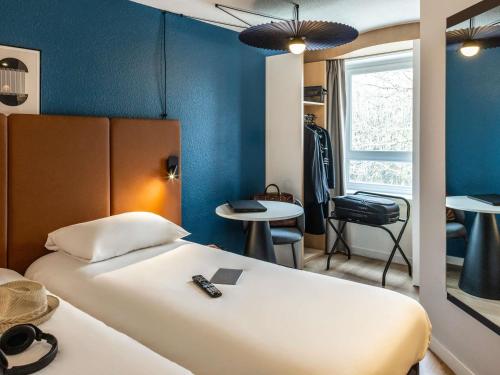 Habitación Doble Estándar - 2 camas del hotel Ibis Toulouse Ponts Jumeaux