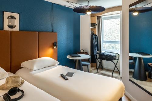 Habitación Doble Estándar - 2 camas del hotel Ibis Toulouse Ponts Jumeaux. Foto 5