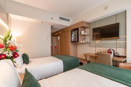 Habitación Doble Deluxe - 2 camas del hotel Américas Copacabana. Foto 3